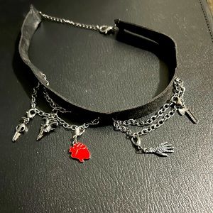 Goth style choker with various charms